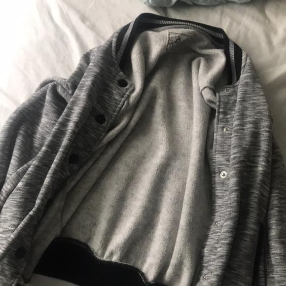 A grey and black jacket - Picture 1 of 1